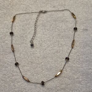 Elegant Gold and Brown Necklace